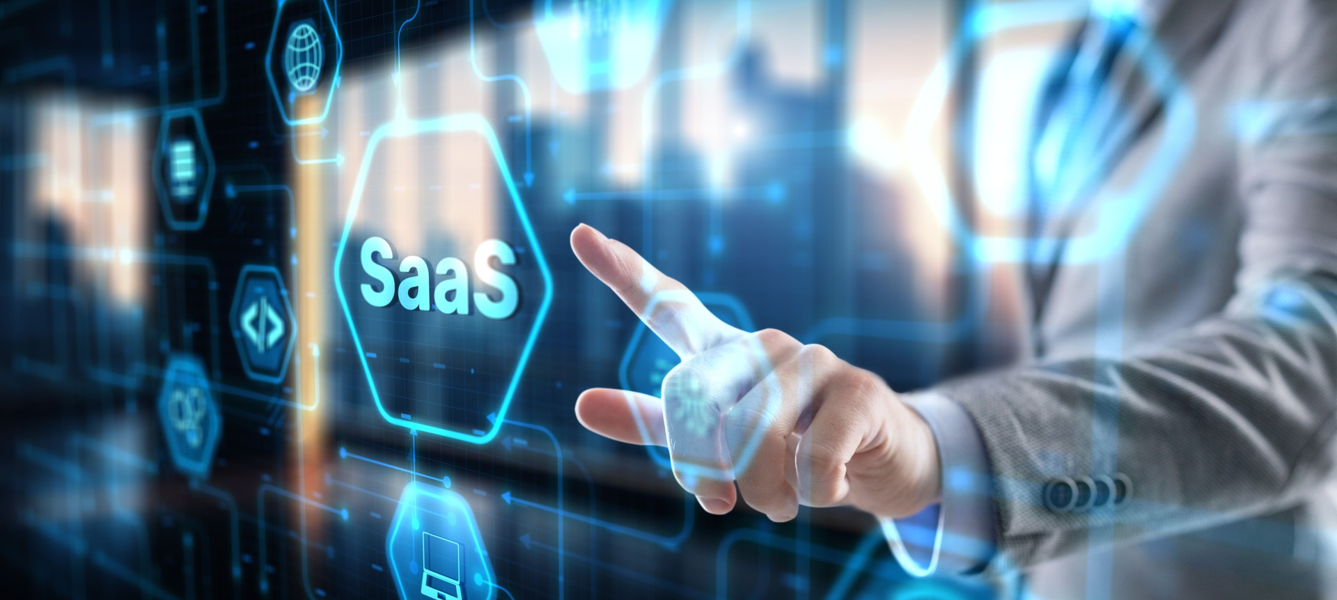 SaaS software as a service concept with hand pressing a button